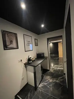 Télévision ou salle de divertissement dans l'établissement La Suite Prestige Jacuzzi,Sauna,Netflix,Disney