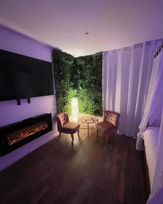 Coin salon dans l'établissement La Suite Bali Jacuzzi,Sauna,Netflix,Disney