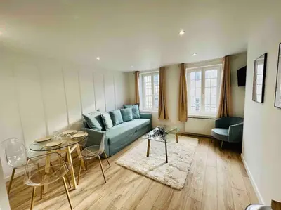 Coin salon dans l'établissement Les Iris