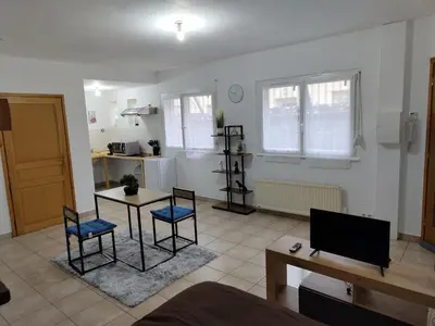 Cuisine ou kitchenette dans l'établissement Cosy Studio