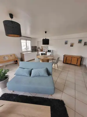 Coin salon dans l'établissement Appartement camon