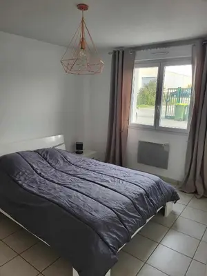 Un ou plusieurs lits dans un hébergement de l'établissement Appartement camon