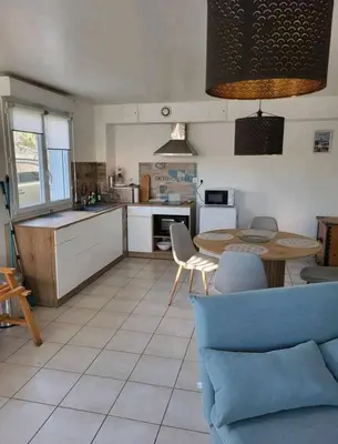 Cuisine ou kitchenette dans l'établissement Appartement camon