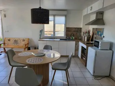 Cuisine ou kitchenette dans l'établissement Appartement camon