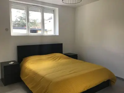 Un ou plusieurs lits dans un hébergement de l'établissement Maison de ville à Pacy-sur-Eure, proche Giverny