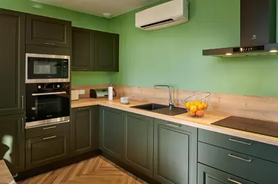 Cuisine ou kitchenette dans l'établissement LE CLOS 1899
