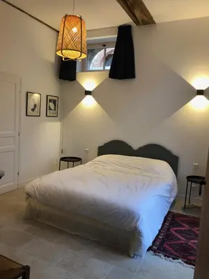 Un ou plusieurs lits dans un hébergement de l'établissement Chateau de Tosny