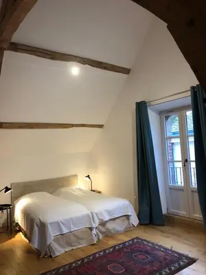 Un ou plusieurs lits dans un hébergement de l'établissement Chateau de Tosny