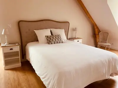 Un ou plusieurs lits dans un hébergement de l'établissement Le Domaine Des Trois Chênes