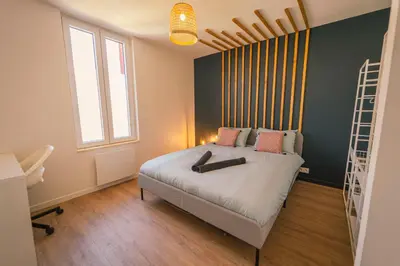 Un ou plusieurs lits dans un hébergement de l'établissement La Villa Relax SPA Luxe