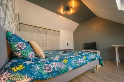 Un ou plusieurs lits dans un hébergement de l'établissement La Villa Relax SPA Luxe
