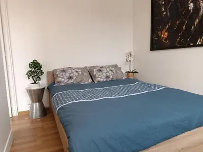 Un ou plusieurs lits dans un hébergement de l'établissement Appartement cathédrale
