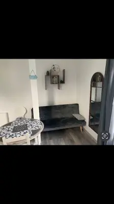 Coin salon dans l'établissement Studio « Bâbord » Le Tréport - vue mer & falaises
