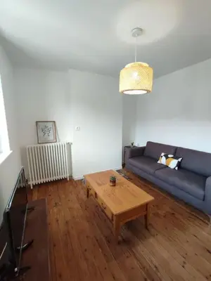 Coin salon dans l'établissement Le Petit Jacques, appartement & garage