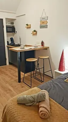 Cuisine ou kitchenette dans l'établissement Le Sable d'Or - charme - détente