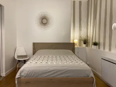 Un ou plusieurs lits dans un hébergement de l'établissement Studio N 2 cosy hypercentre, rue Saint Nicolas