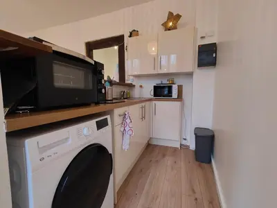 Cuisine ou kitchenette dans l'établissement Appart'HomeCity - Rouen Marne Impressionniste