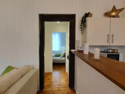 Un ou plusieurs lits dans un hébergement de l'établissement Appart'HomeCity - Rouen Marne Impressionniste