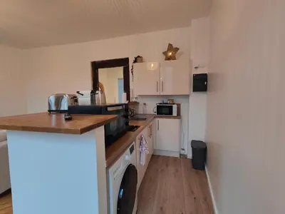Cuisine ou kitchenette dans l'établissement Appart'HomeCity - Rouen Marne Impressionniste
