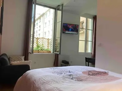 Un ou plusieurs lits dans un hébergement de l'établissement Studio N1 plein centre ville