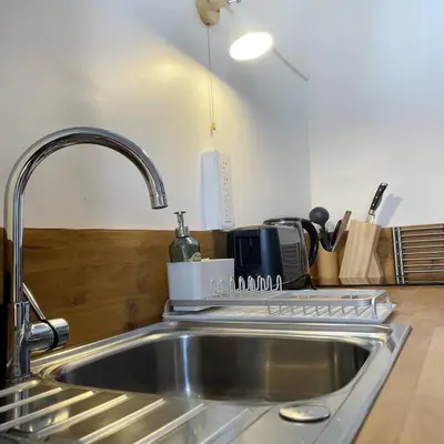 Cuisine ou kitchenette dans l'établissement Appartements 4 vents by La Boîte En Plus