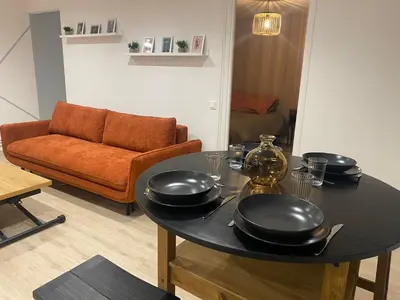 Coin salon dans l'établissement Élégant, spacieux, 2 couchages, proche centre