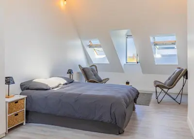 Un ou plusieurs lits dans un hébergement de l'établissement Maison de ville en bord de Seine à La Bouille
