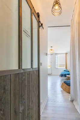 Un ou plusieurs lits dans un hébergement de l'établissement Maison de ville en bord de Seine à La Bouille