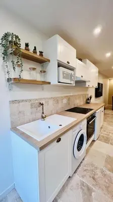Cuisine ou kitchenette dans l'établissement Maison Aveny Spa