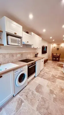 Cuisine ou kitchenette dans l'établissement Maison Aveny Spa