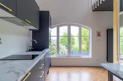 Cuisine ou kitchenette dans l'établissement Le Lodge des Villettes