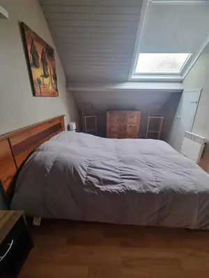 Un ou plusieurs lits dans un hébergement de l'établissement A la maison du bonheur