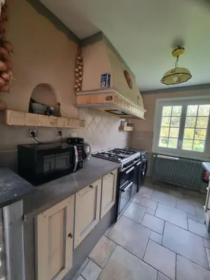 Cuisine ou kitchenette dans l'établissement A la maison du bonheur