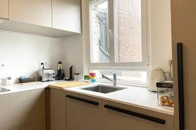 Cuisine ou kitchenette dans l'établissement Le 39 Élégance - Prox Gare et Ville
