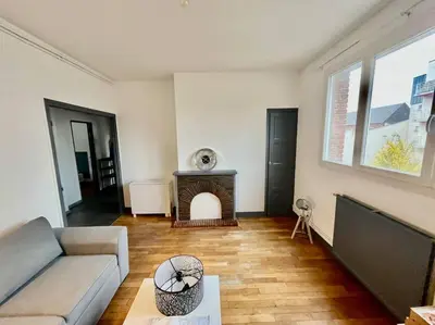 Coin salon dans l'établissement Le Lovely avec parking
