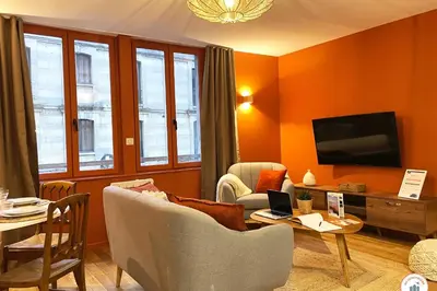 Télévision ou salle de divertissement dans l'établissement Le Terracotta - Centre Historique de Rouen