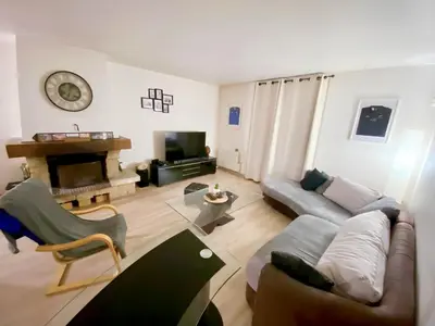 Coin salon dans l'établissement Maison pour Jeux Olympiques 2024