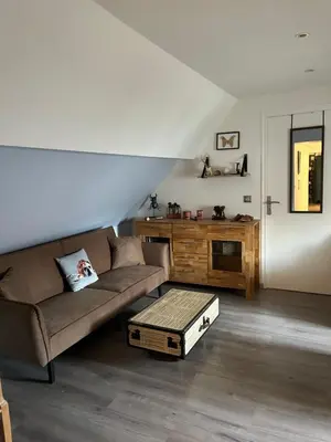 Coin salon dans l'établissement Le relais du bord de seine