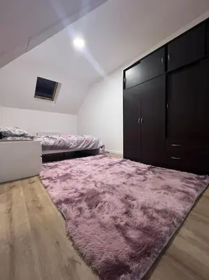 Un ou plusieurs lits dans un hébergement de l'établissement Logement Friville