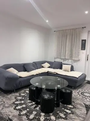 Coin salon dans l'établissement Logement Friville