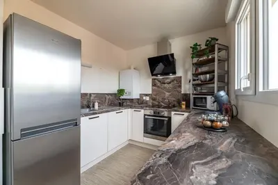 Cuisine ou kitchenette dans l'établissement Appartement du Blanchet très agréable