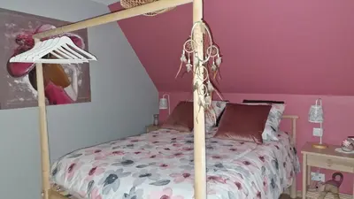 Un ou plusieurs lits dans un hébergement de l'établissement Les 3 Hirondelles - Maison avec grand jardin
