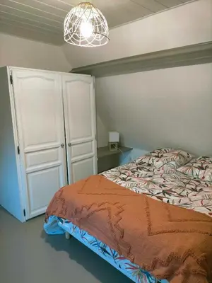 Un ou plusieurs lits dans un hébergement de l'établissement Le cottage de la Prée
