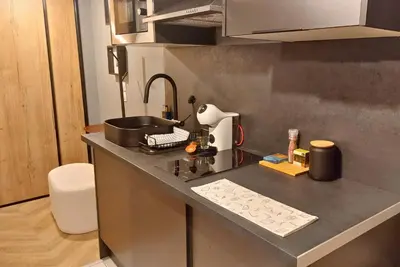 Cuisine ou kitchenette dans l'établissement L'Aurore Berbère, hypercentre de Rouen, au calme