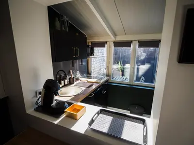 Cuisine ou kitchenette dans l'établissement Studio Le Marais - Beauvais Sud