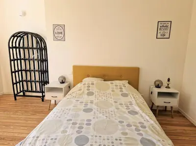 Un ou plusieurs lits dans un hébergement de l'établissement Magnifique Maison de Campagne