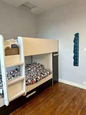 Un ou plusieurs lits superposés dans un hébergement de l'établissement Le Magnolia Maison 12 Couchages