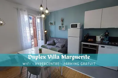 Cuisine ou kitchenette dans l'établissement Villa Marguerite