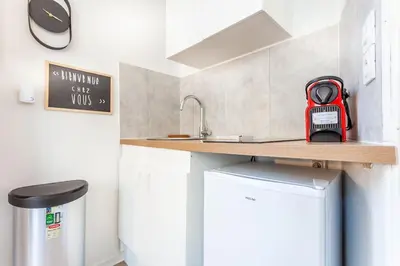 Cuisine ou kitchenette dans l'établissement La Suite : studio Hypercentre - Cathédral