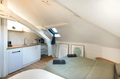 Cuisine ou kitchenette dans l'établissement Le Cocon : studio en Hypercentre Cathédrale